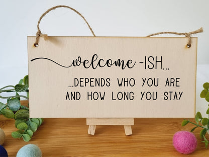 The Plum Penguin Handmade Wooden Hanging Wall Plaque Welcome Ish Depends How Long You Stay Funny Rude Joke Novelty Sign